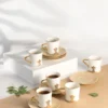 Conjunto de Xícaras de Porcelana com 12 peças - Marfim e Dourado